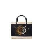 Petite Market Bag in Black with Sun & Moon Bead, front view with blank natural leather label ready for personalization; gold and pearl beaded sun and moon on black jute with black leather handles