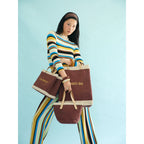 Mulberry Market Bag, Petite Market Bag and Petite Bucket carried together — Cole Moser editorial, view 260851