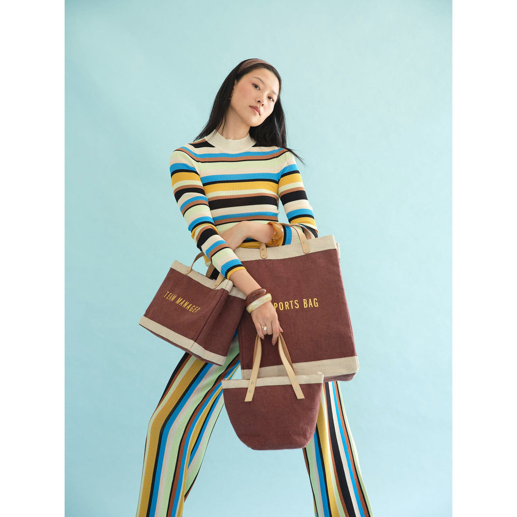 Mulberry Market Bag, Petite Market Bag and Petite Bucket carried together — Cole Moser editorial, view 260854