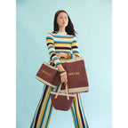Mulberry Market Bag, Petite Market Bag and Petite Bucket carried together — Cole Moser editorial, view 260870