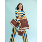 Mulberry Market Bag, Petite Market Bag and Petite Bucket carried together — Cole Moser editorial, view 260876