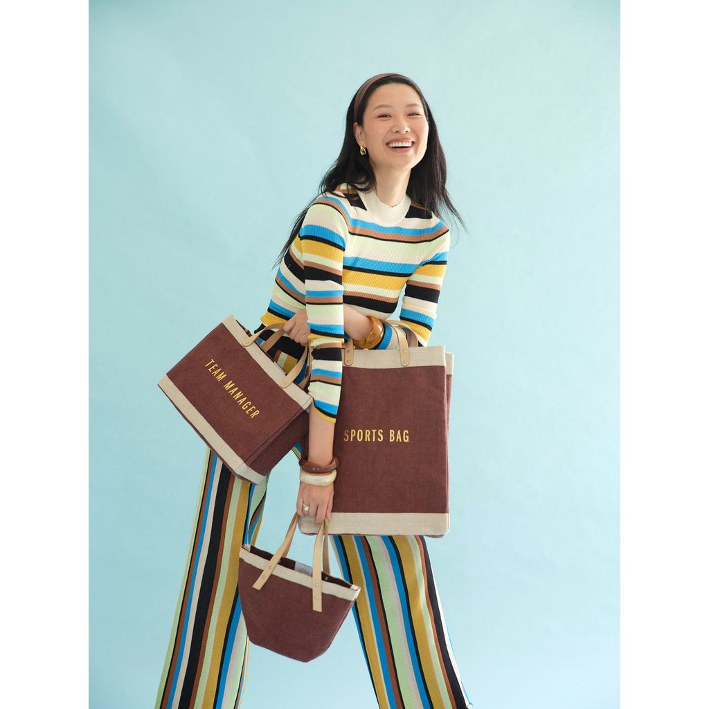 Mulberry Market Bag, Petite Market Bag and Petite Bucket carried together — Cole Moser editorial, view 260879