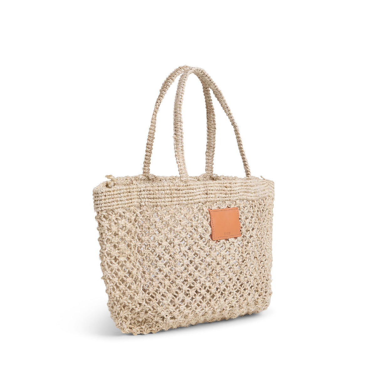 Petite Mercado Tote in Natural — three-quarter view showing the open weave and crocheted handles