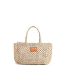 Petite Mercado Tote in Natural — handwoven open-weave jute tote, front view with gold foil monogram on the leather patch