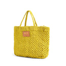Petite Mercado Tote in Ocre — three-quarter view from the opposite side, gold foil monogram on the leather patch
