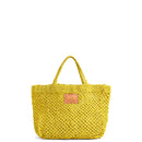 Petite Mercado Tote in Ocre — handwoven open-weave jute tote, front view with gold foil monogram on the leather patch