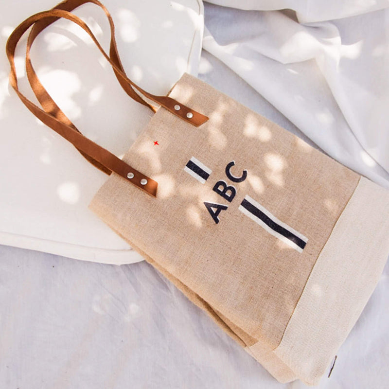 Wine Tote in Natural with Black Monogram