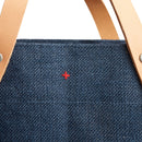 description_The cross stitch has come to symbolize the common thread that connects all global citizens committed to quality and change.